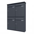 Bank of 4 vertical wall mounted letterboxes